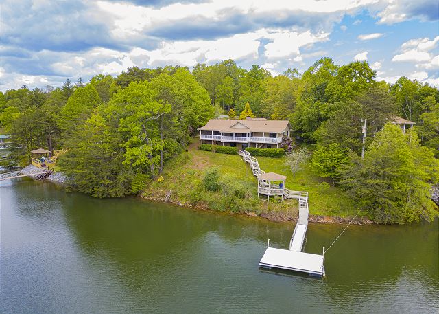 Miles Away Lakehouse on Lake Nottely in Blairsville GA. Beautiful 3 bedroom 2 bath with boat dock, internet and wood burning fireplace. Pet Friendly Beautiful Views